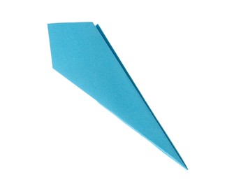 Photo of One handmade light blue paper plane isolated on white