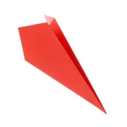 Photo of One handmade coral paper plane isolated on white