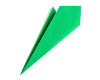 Photo of One handmade green paper plane isolated on white