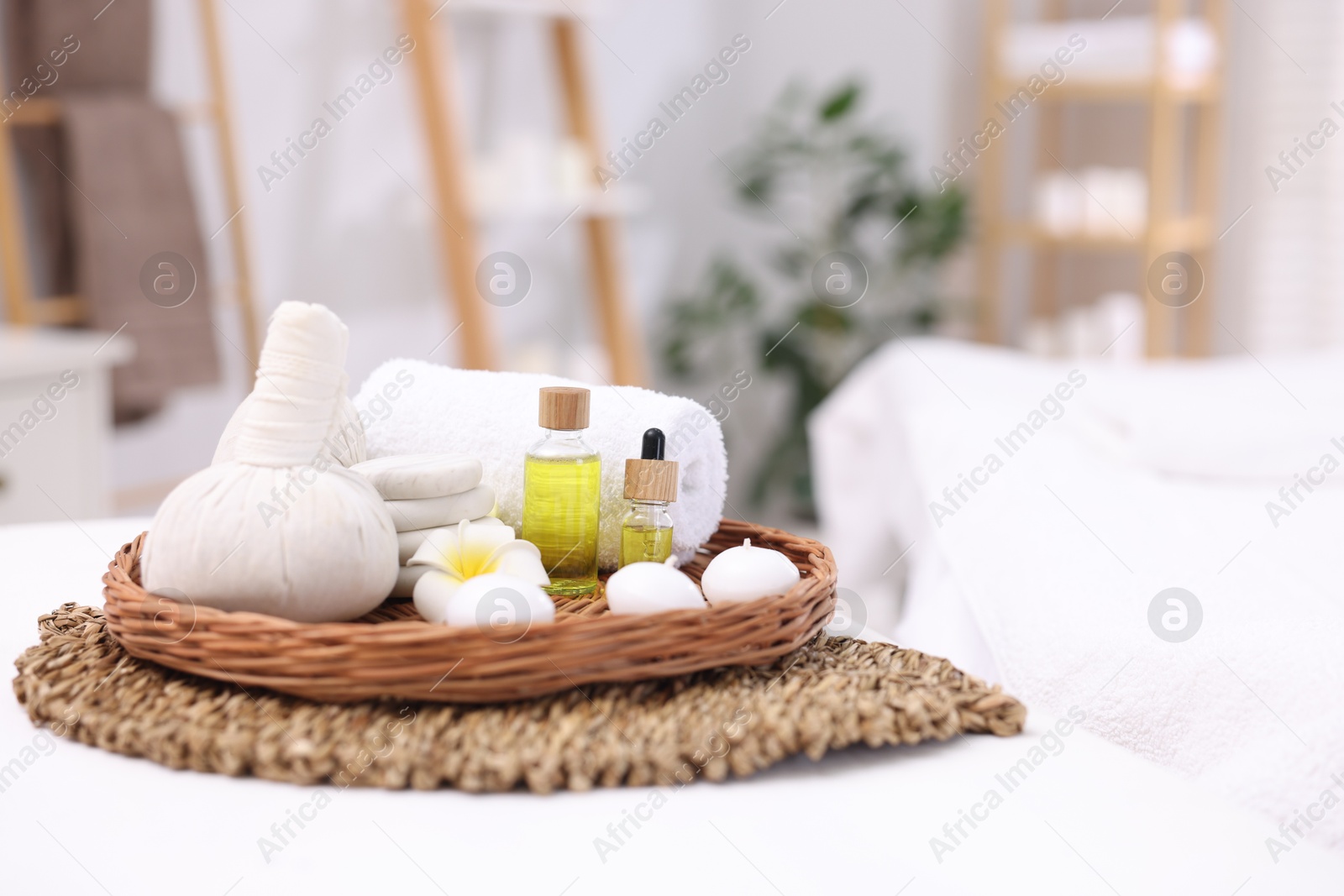 Photo of Different cosmetic products for spa treatment in salon