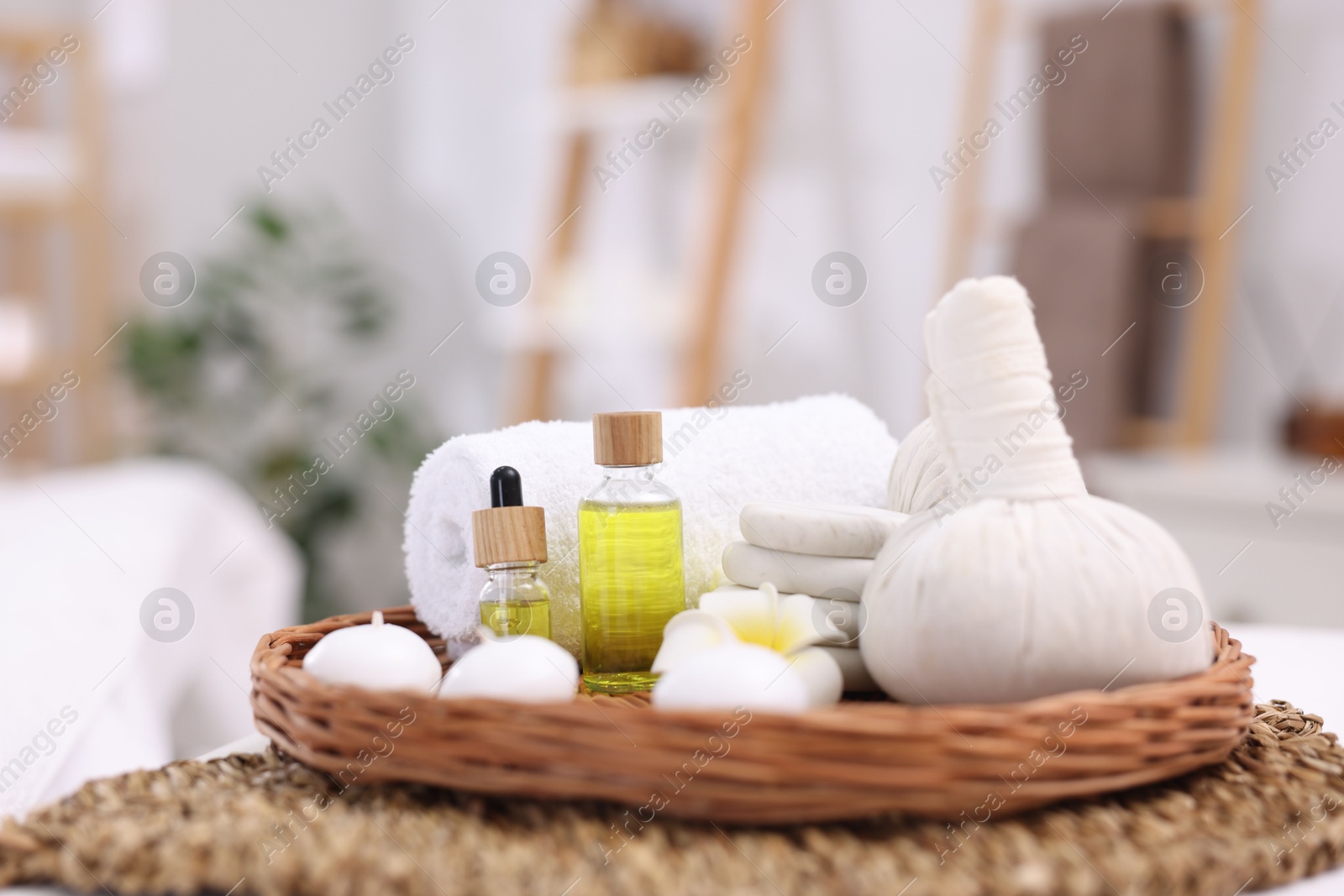 Photo of Different cosmetic products for spa treatment in salon