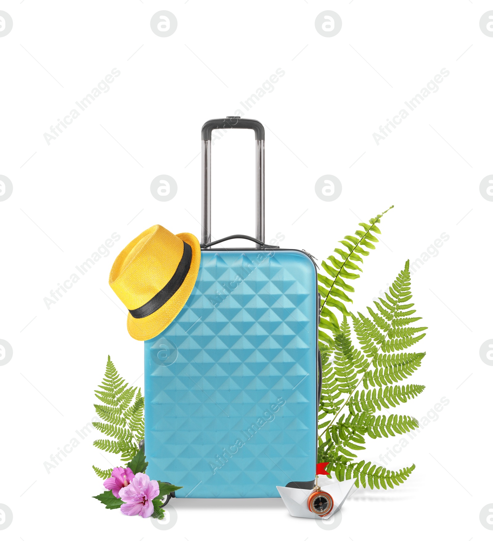 Image of Light blue travel suitcase, hat, paper boat, tropical leaves and flowers on white background