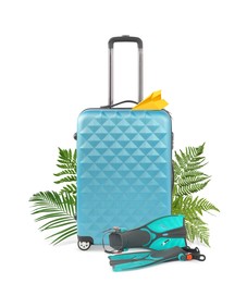 Light blue travel suitcase, tropical leaves, paper plane and swim fins on white background