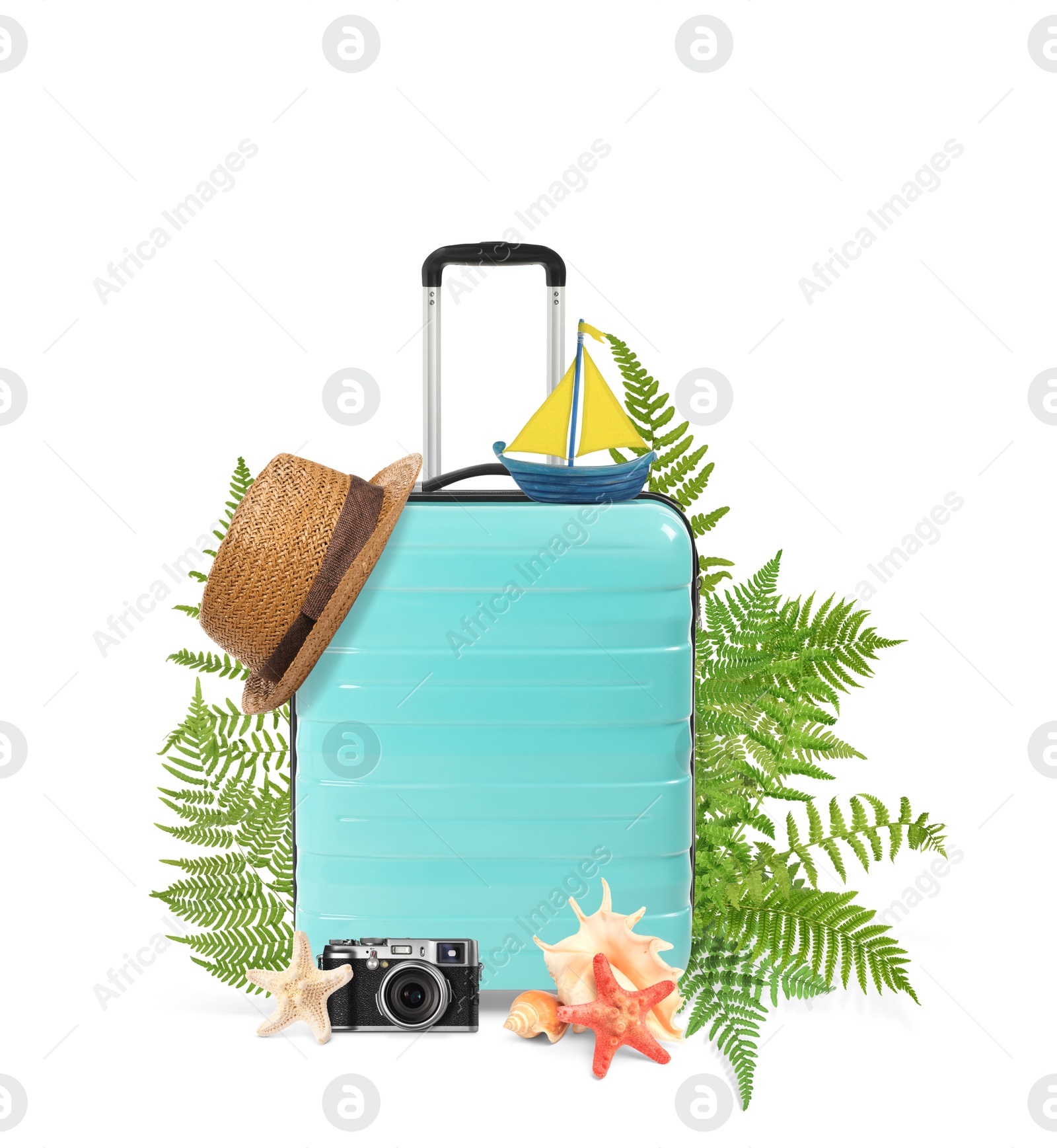 Image of Turquoise travel suitcase, tropical leaves, camera, sea stars, seashells, hat and toy sailboat on white background