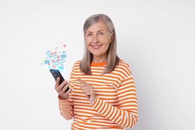 Image of Happy woman using mobile phone on white background. New message sign and other notifications over gadget