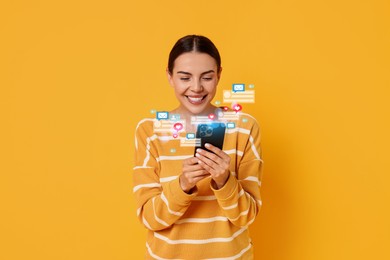 Image of Happy woman using mobile phone on orange background. New message sign and other notifications over gadget