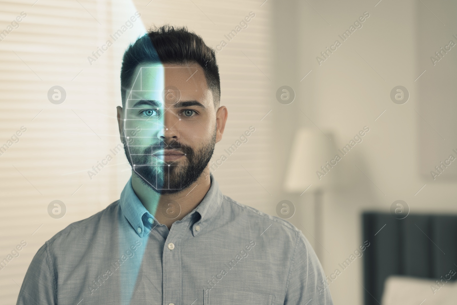 Image of Facial recognition system. Man undergoing biometric verification at home