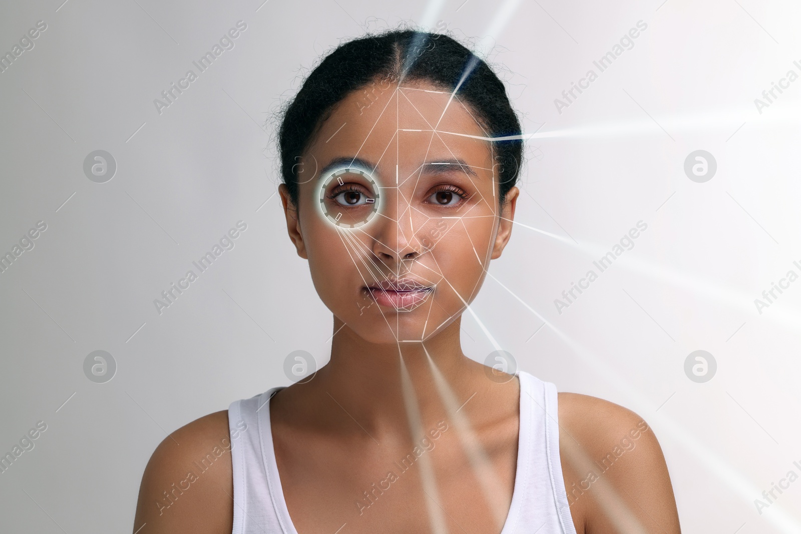 Image of Facial and iris recognition system. Woman undergoing biometric verification on white background