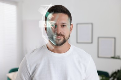 Image of Facial recognition system. Man undergoing biometric verification at home