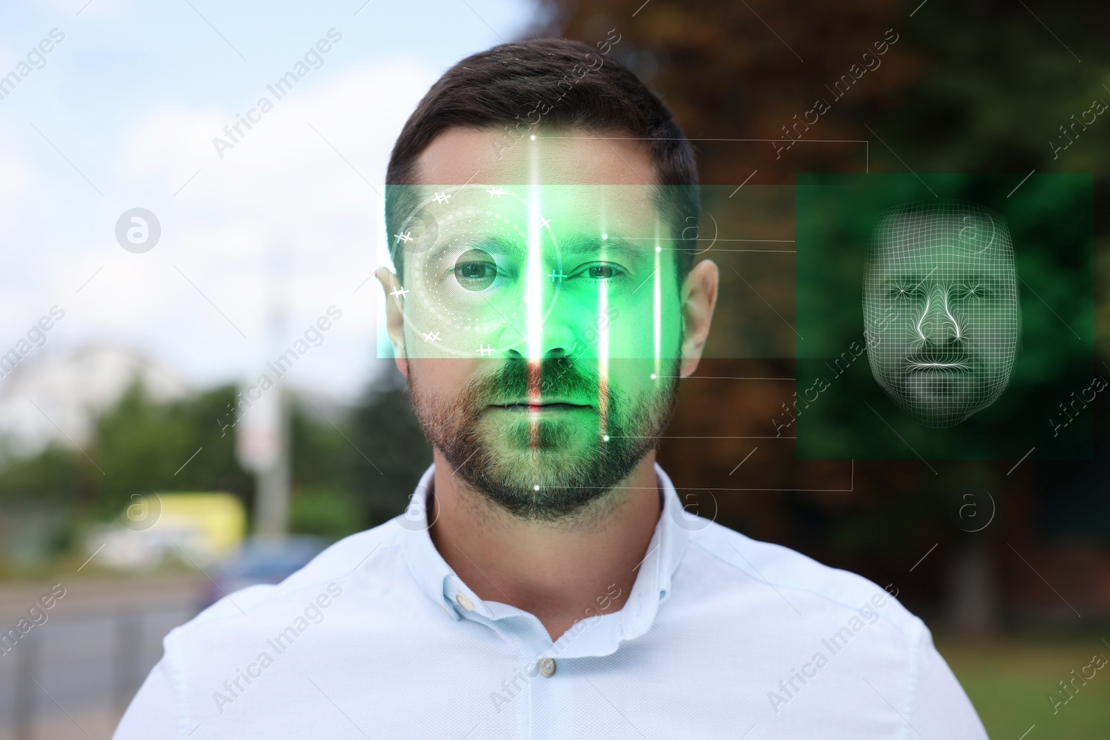 Image of Facial and iris recognition system. Man undergoing biometric verification outdoors