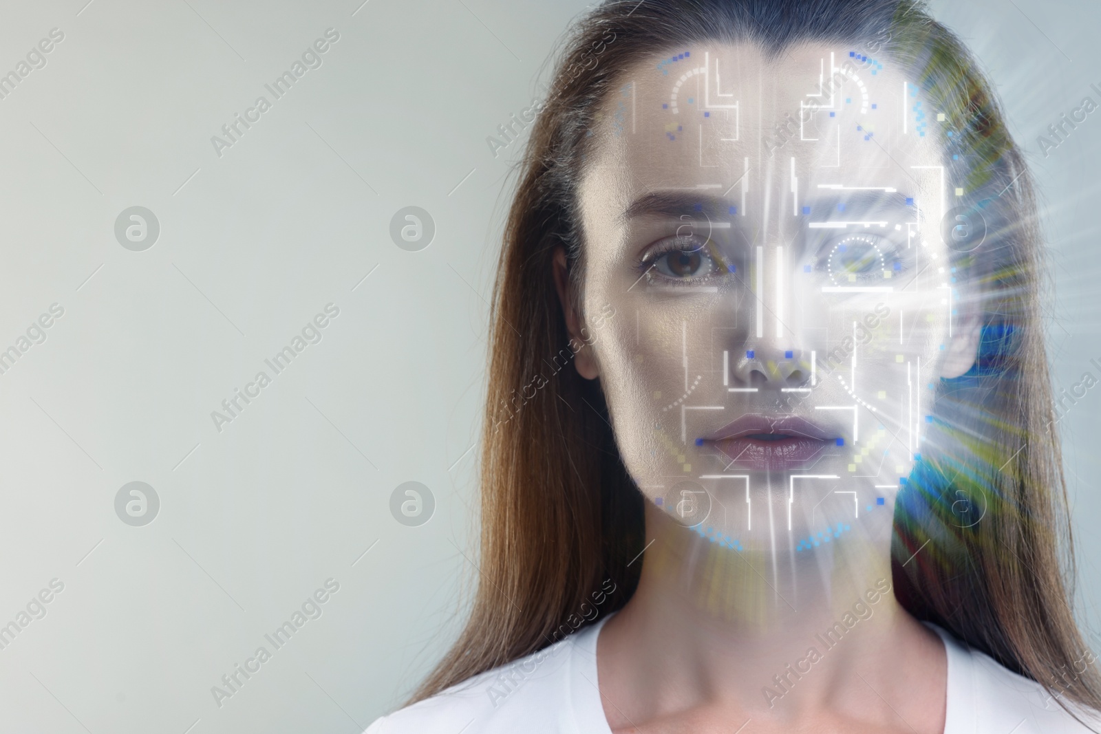 Image of Facial and iris recognition system. Woman undergoing biometric verification on grey background