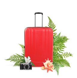 Red travel suitcase, camera, sea star, seashells, tropical leaves and flower on white background