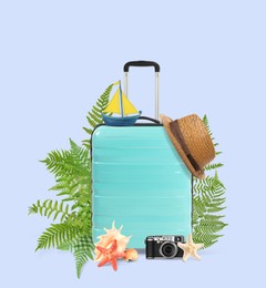 Image of Turquoise travel suitcase, tropical leaves, camera, sea stars, seashells, hat and toy sailboat on color background