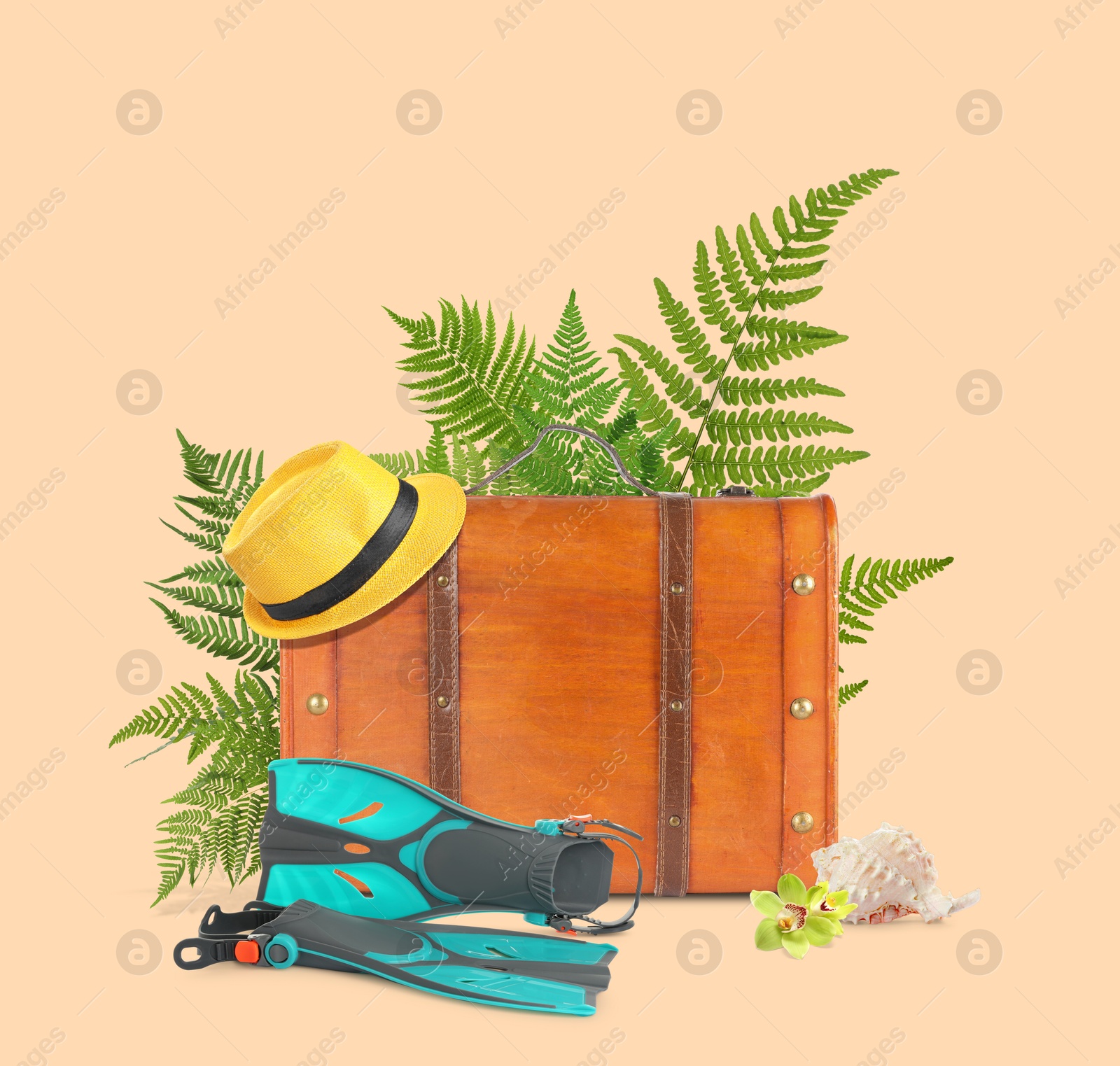 Image of Brown travel suitcase, hat, swim fins, seashell, tropical leaves and flower on pink beige background