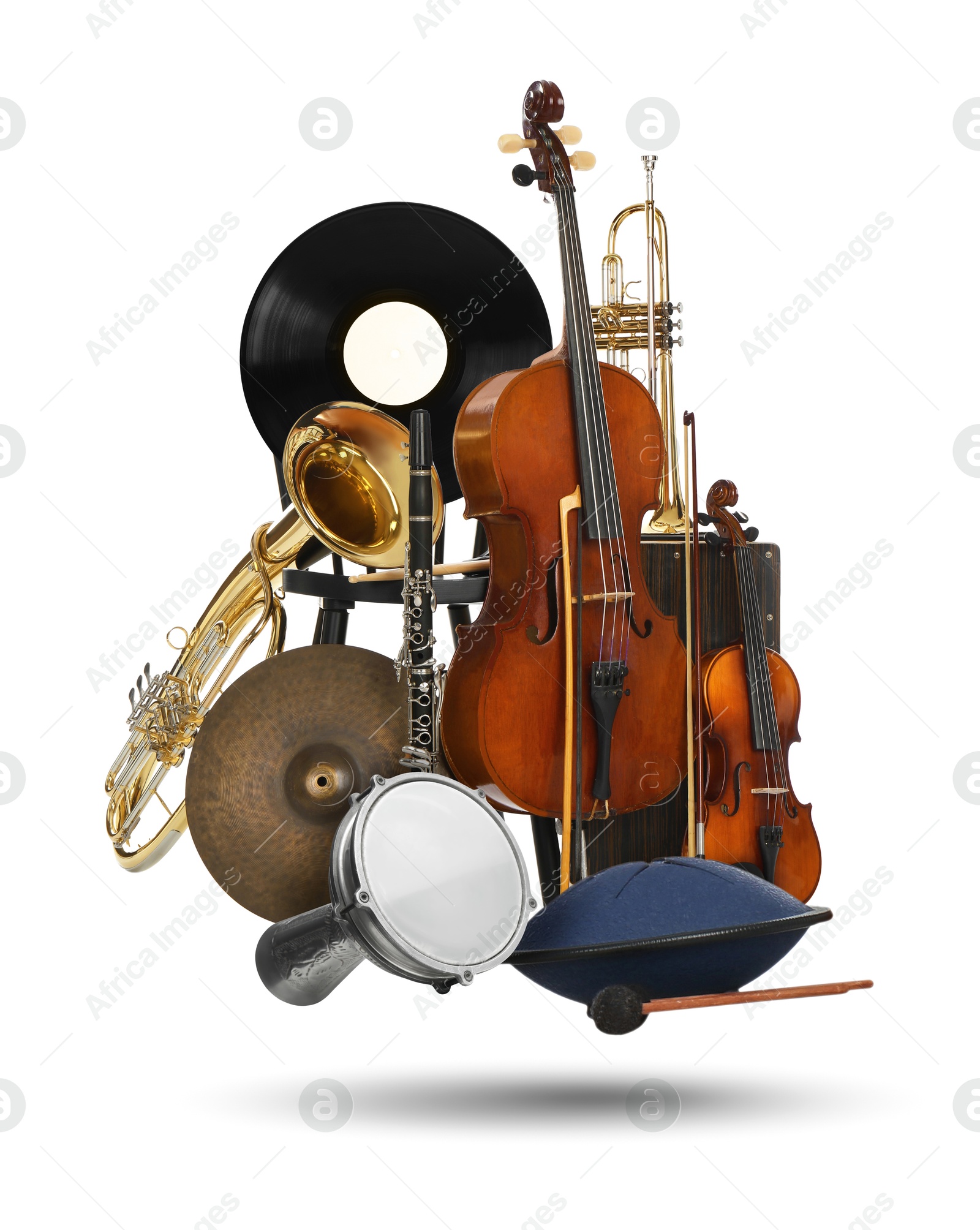 Image of Different musical instruments in air on white