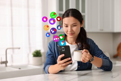 Image of Happy woman using mobile phone while drinking beverage at home. New message sign and other notifications over gadget