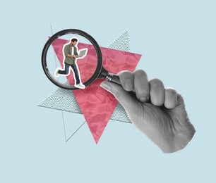 Woman's hand holding magnifying glass with man inside on light blue background, creative art collage