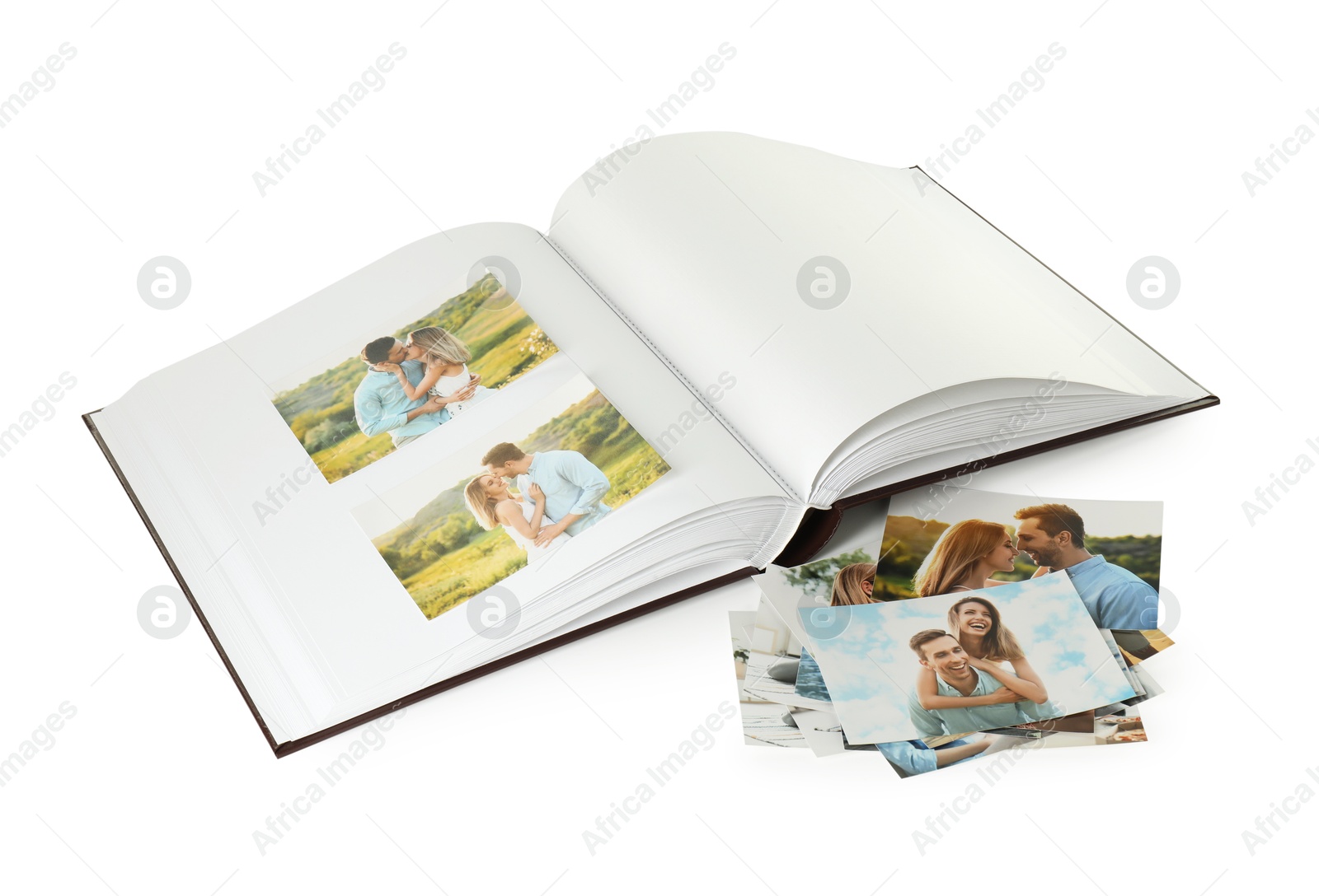 Photo of Open photo album with different photos isolated on white