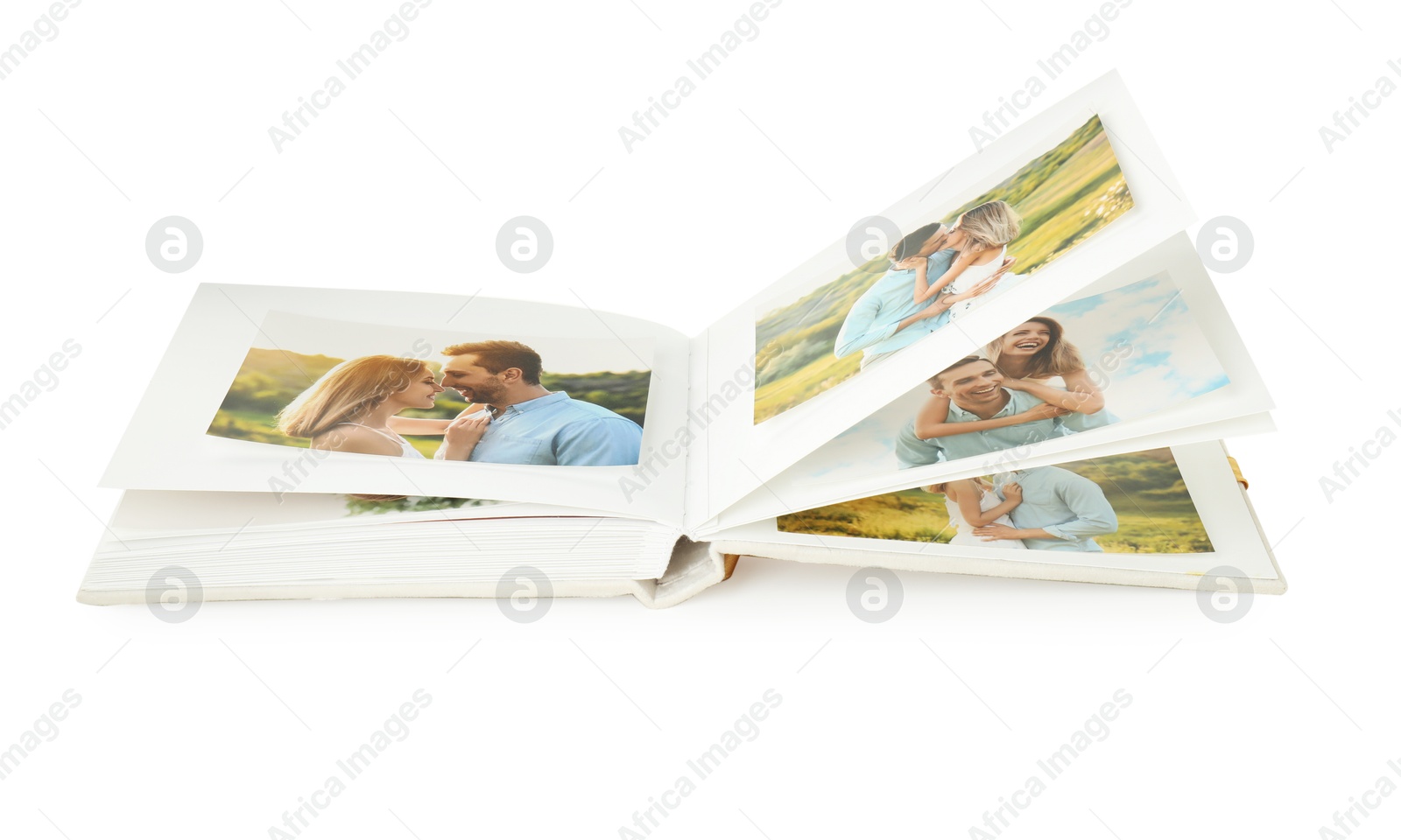 Photo of Open photo album with different photos isolated on white