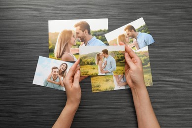 Photo of Woman with different photos at black wooden table, top view