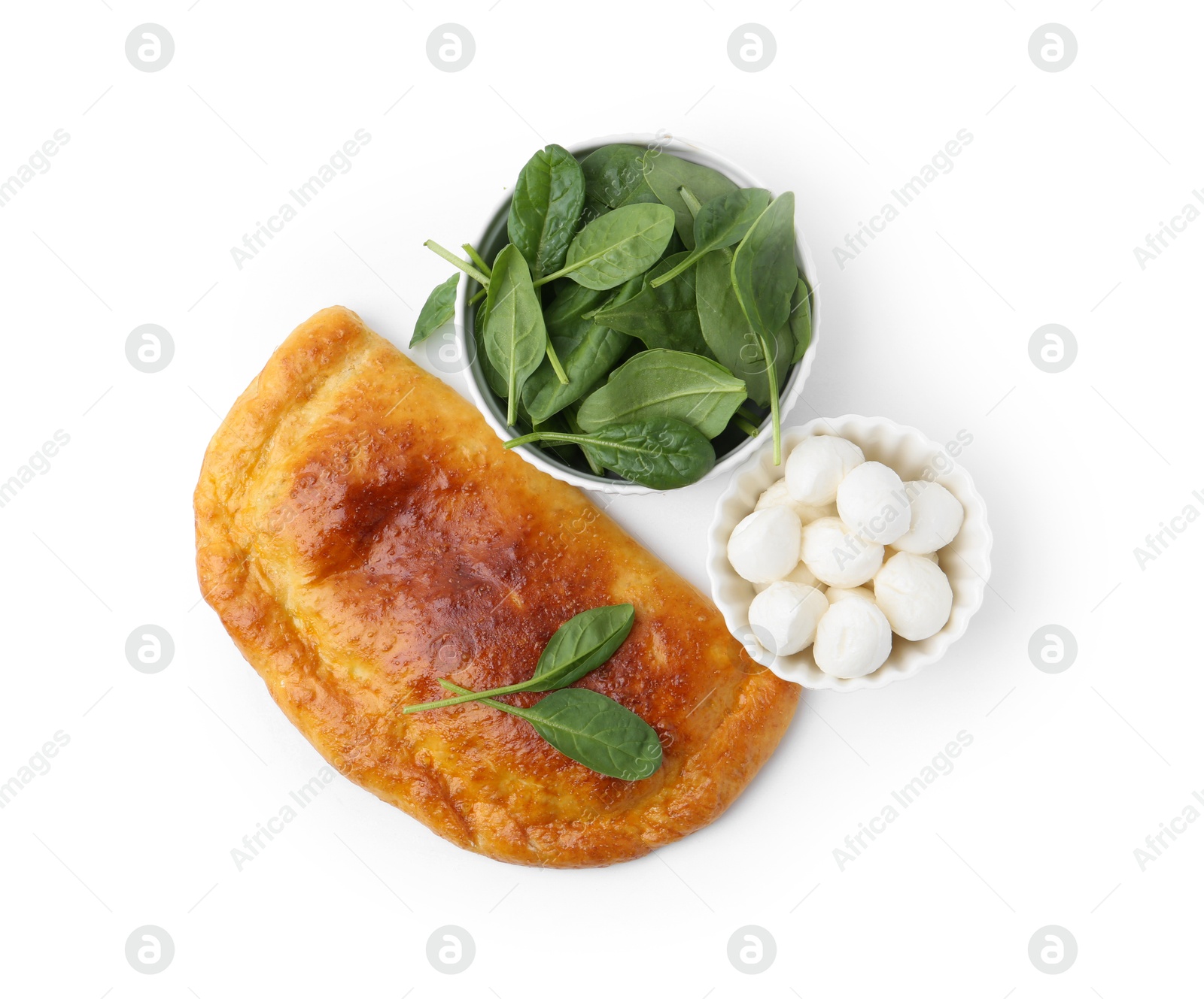 Photo of Tasty calzone with basil and mozzarella cheese isolated on white, top view