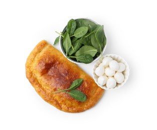 Photo of Tasty calzone with basil and mozzarella cheese isolated on white, top view