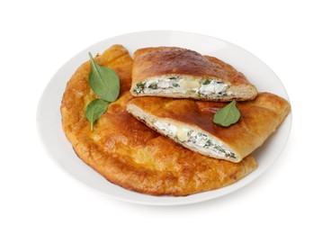 Photo of Tasty calzones with cheese and basil isolated on white