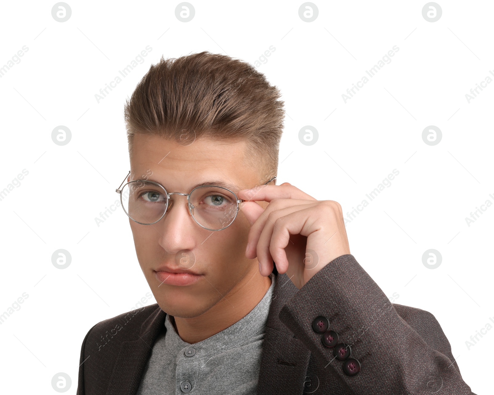 Photo of Handsome young man with stylish haircut on white background