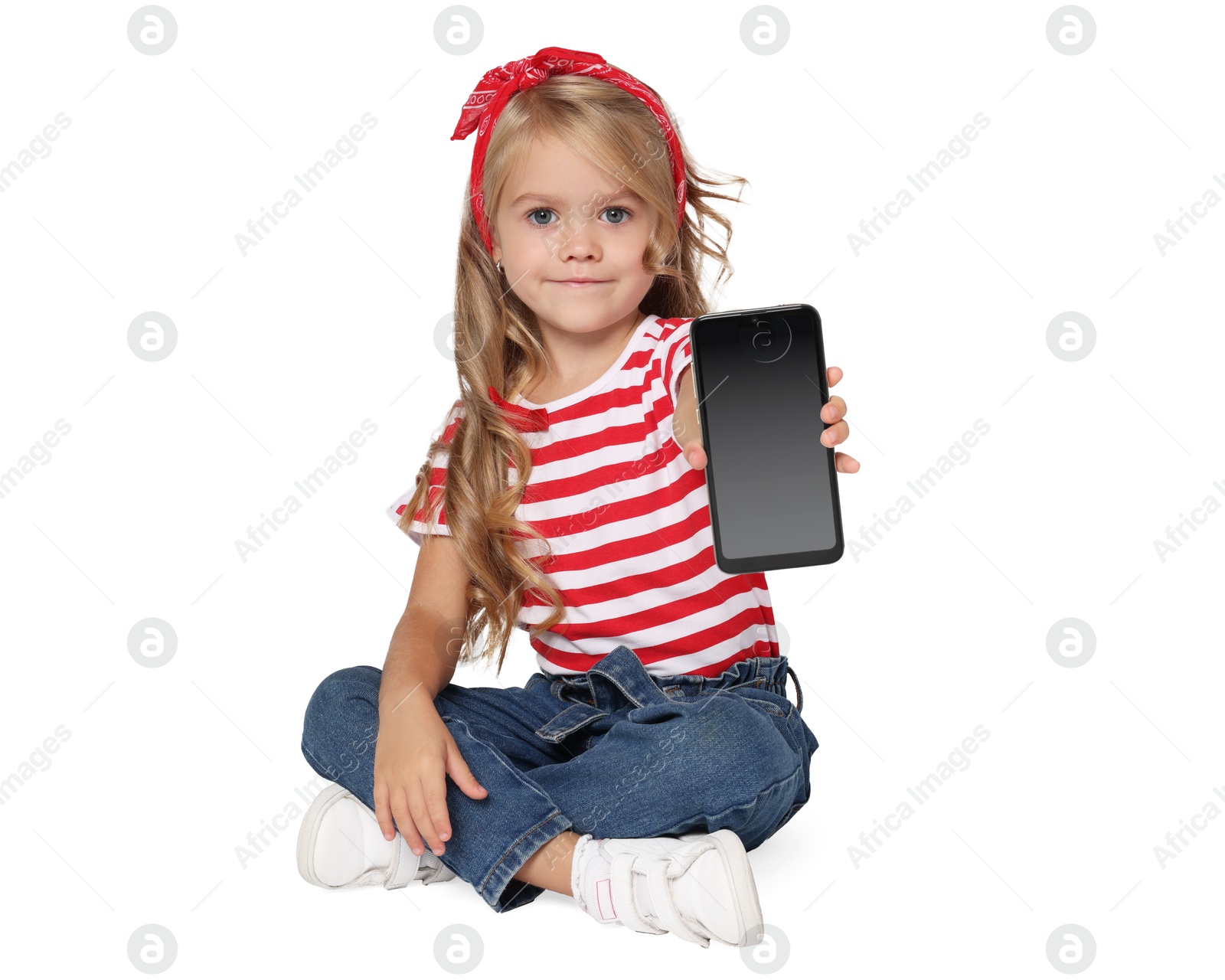 Photo of Cute little girl with smartphone on white background