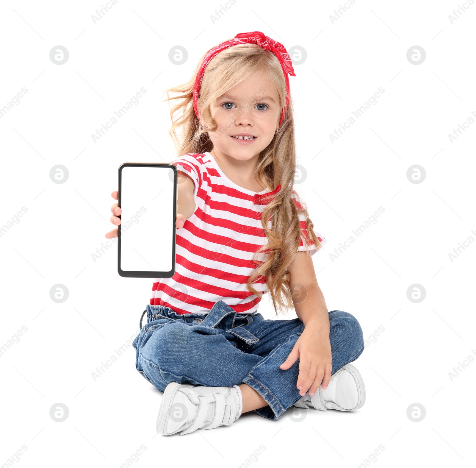 Photo of Cute little girl with smartphone on white background