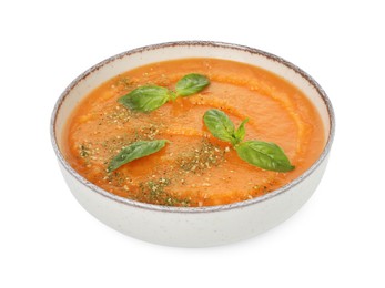 Photo of Delicious sweet potato soup with basil in bowl isolated on white