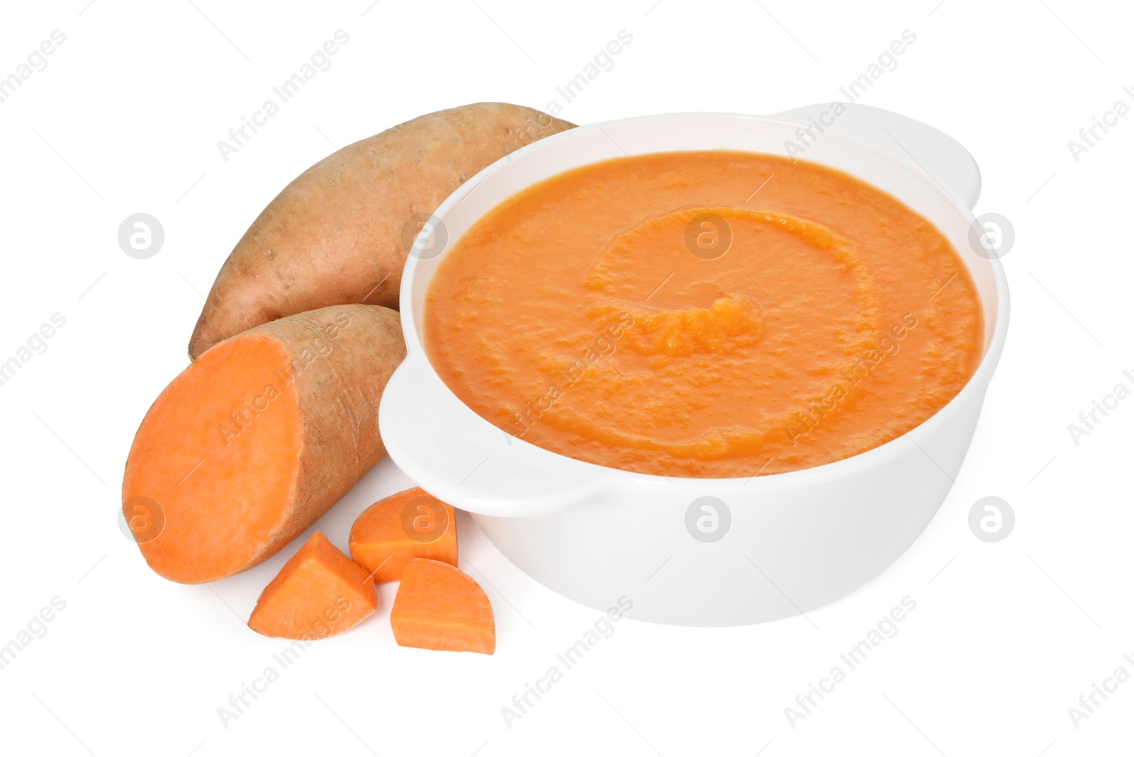 Photo of Delicious sweet potato soup and fresh vegetables isolated on white