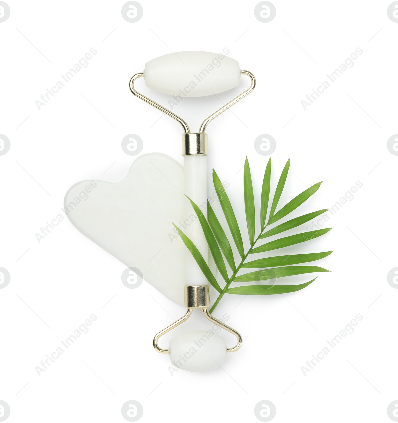 Photo of Face roller and gua sha tool isolated on white, top view