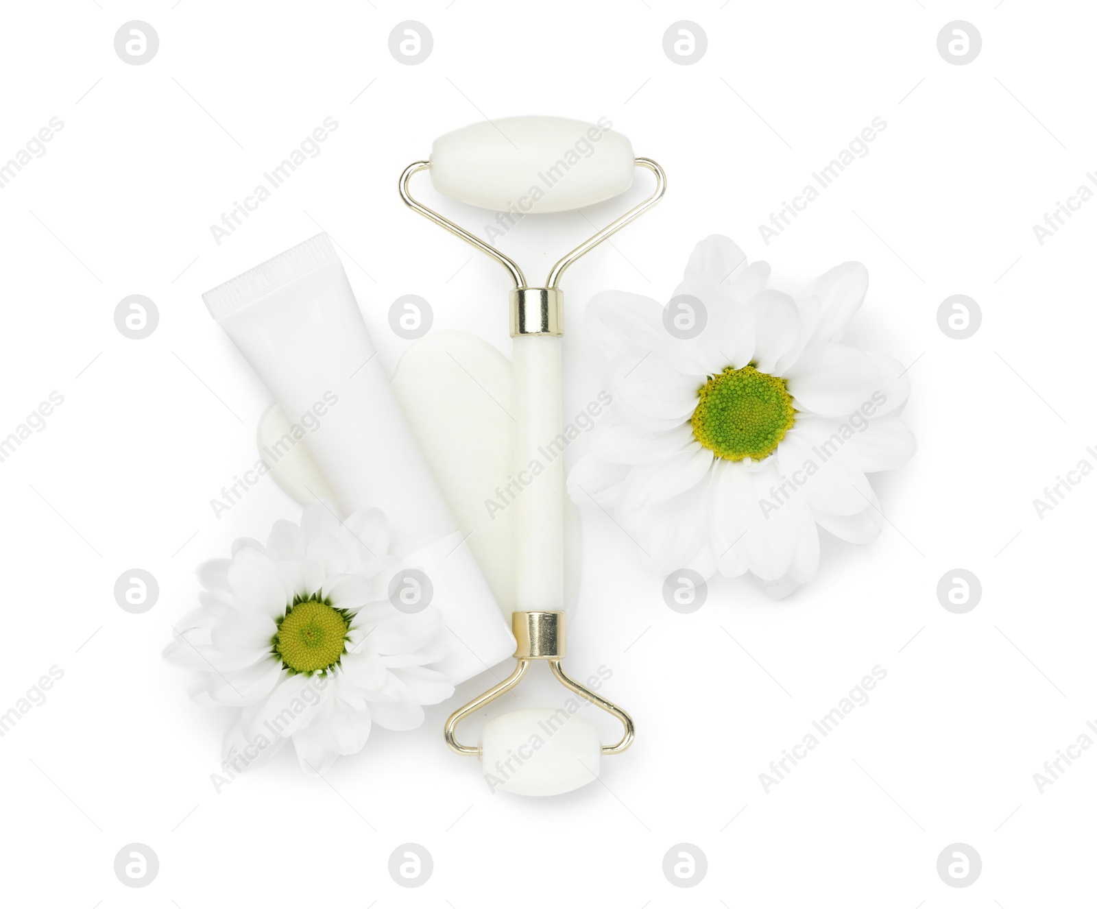 Photo of Face roller, cosmetic product, flowers and gua sha tool isolated on white, top view