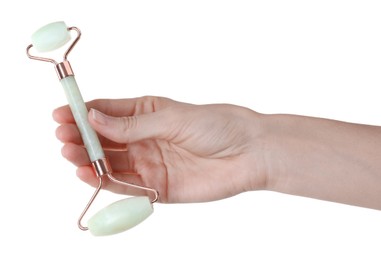 Woman holding face roller on white background, closeup