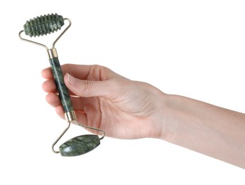 Photo of Woman holding face roller on white background, closeup