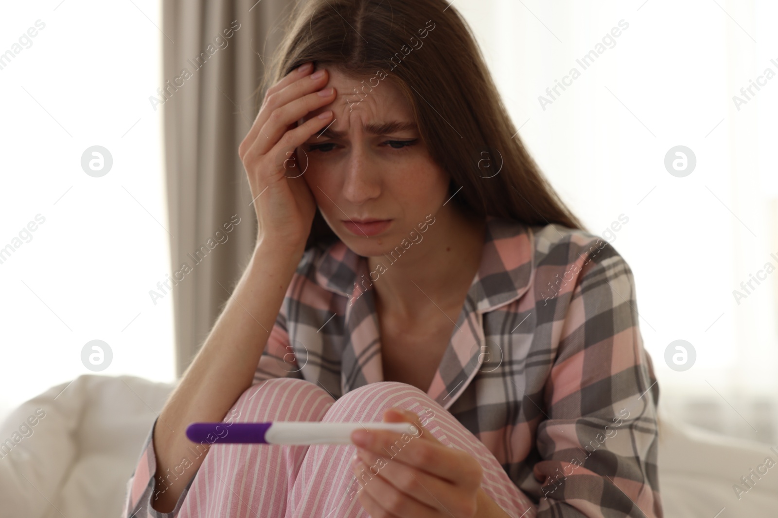 Photo of Woman with negative pregnancy test at home