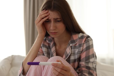 Photo of Woman with negative pregnancy test at home