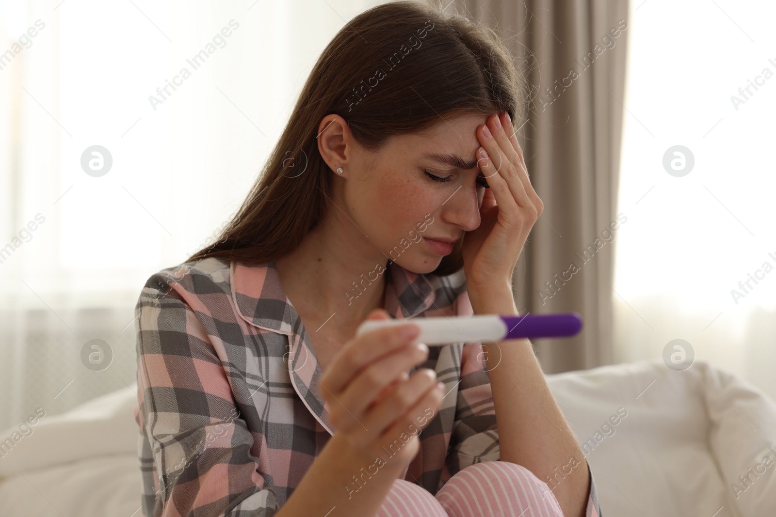 Photo of Woman with negative pregnancy test at home