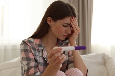 Photo of Woman with negative pregnancy test at home