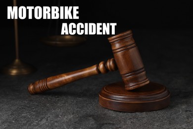 Image of Motorbike accident law. Judge's gavel on grey table