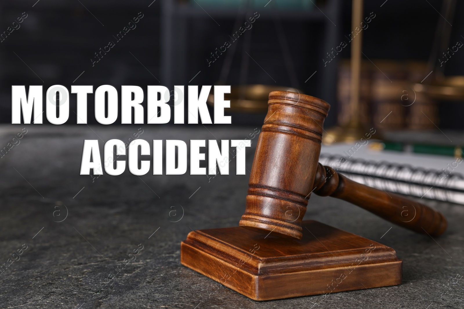 Image of Motorbike accident law. Judge's gavel on grey table,