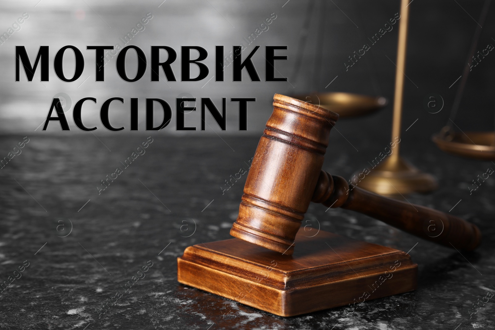 Image of Motorbike accident law. Judge's gavel on dark table