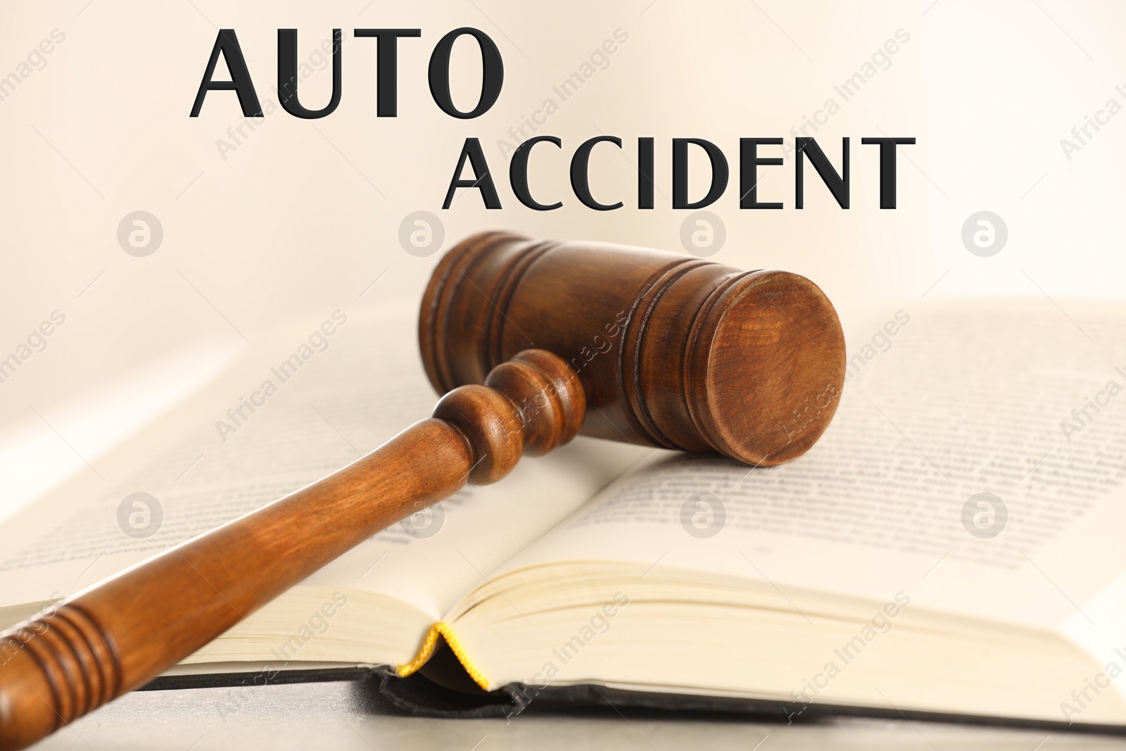 Image of Auto accident law. Judge's gavel and book on table