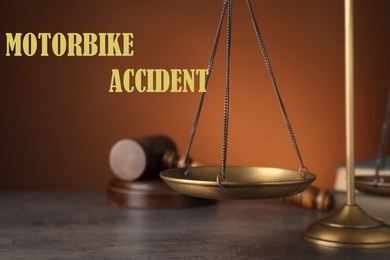 Image of Motorbike accident law. Scales of justice and judge's gavel on table against brown background