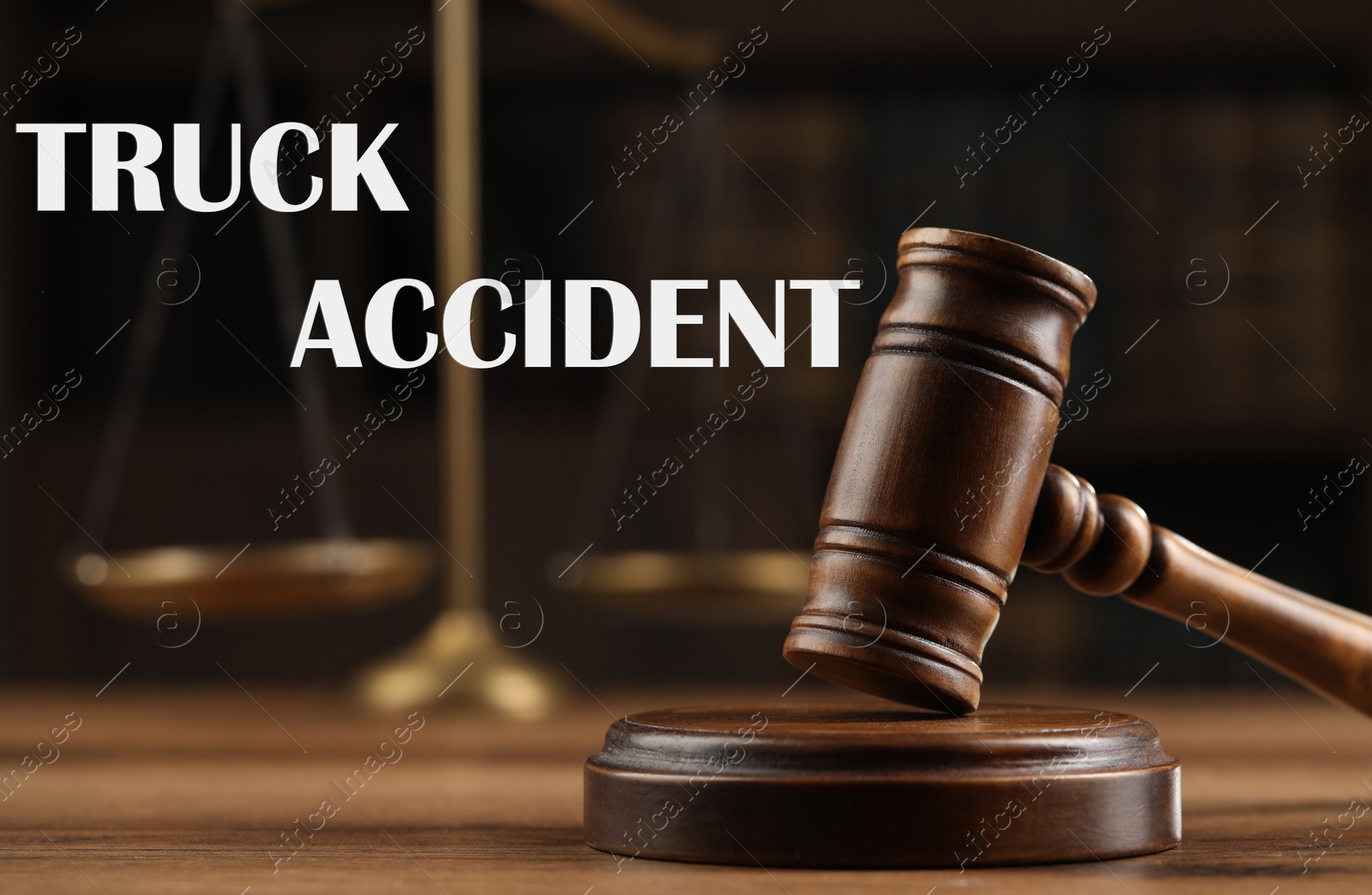 Image of Truck accident law. Wooden judge's gavel and scales of justice on table