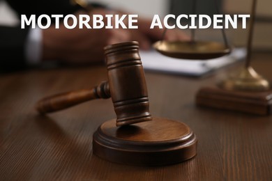 Image of Motorbike accident law. Judge at wooden table, focus on gavel