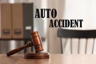 Auto accident law. Judge's gavel on wooden table in office