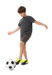 Photo of Boy with soccer ball playing football on white background