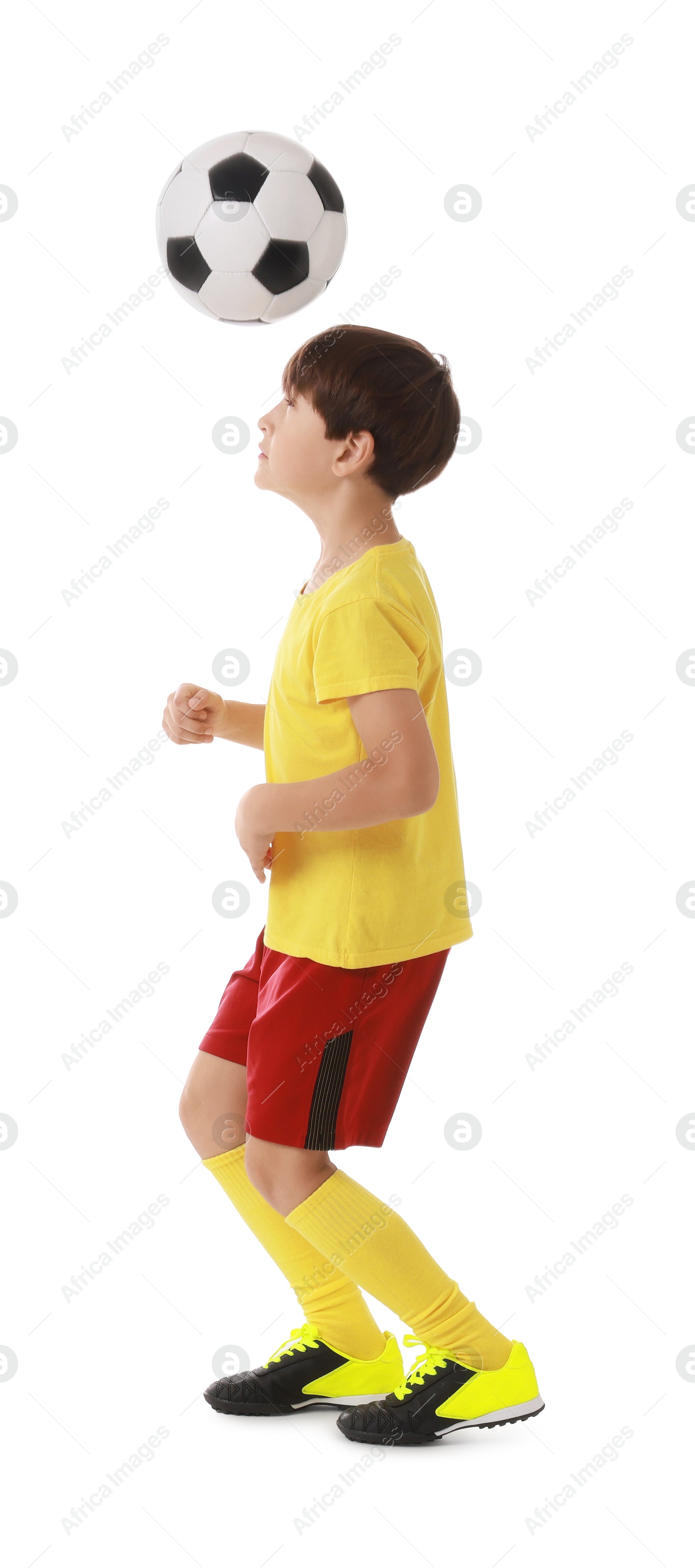 Photo of Boy with soccer ball playing football on white background